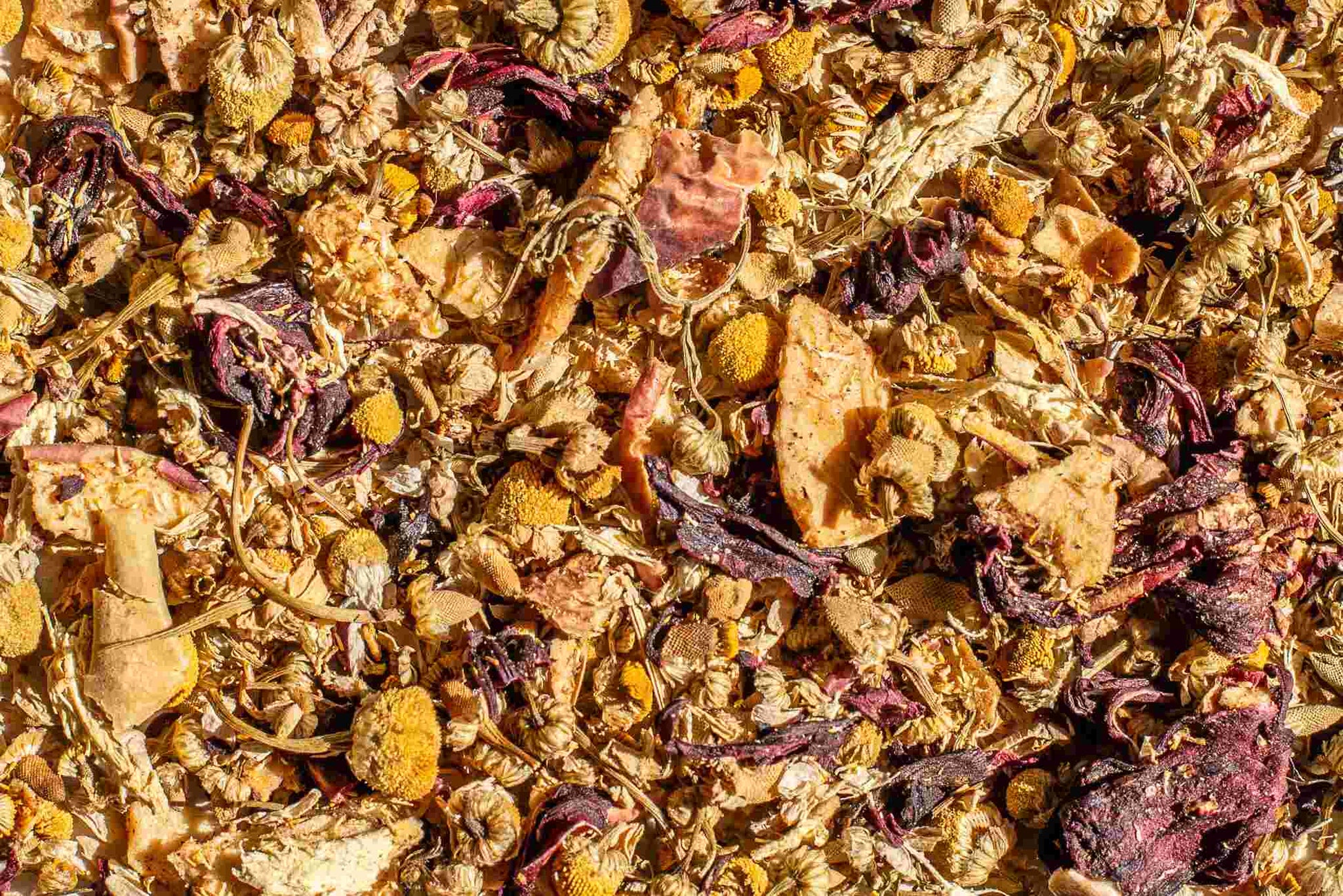 Close-up of Decaf-G loose leaf chamomile tea blend.