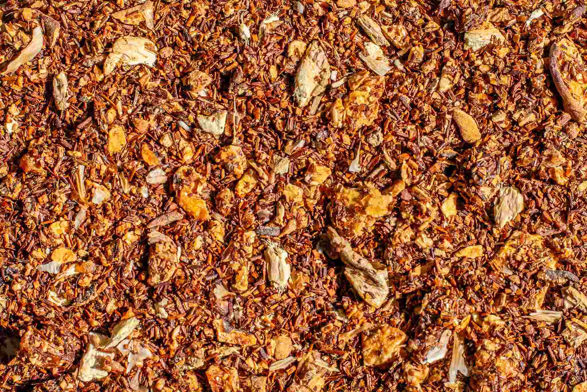 Close-up of (Tea)ches of Peaches loose leaf red rooibos blend.